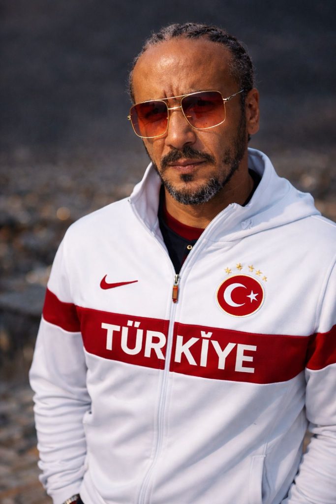Man in Turkey sports jacket and sunglasses