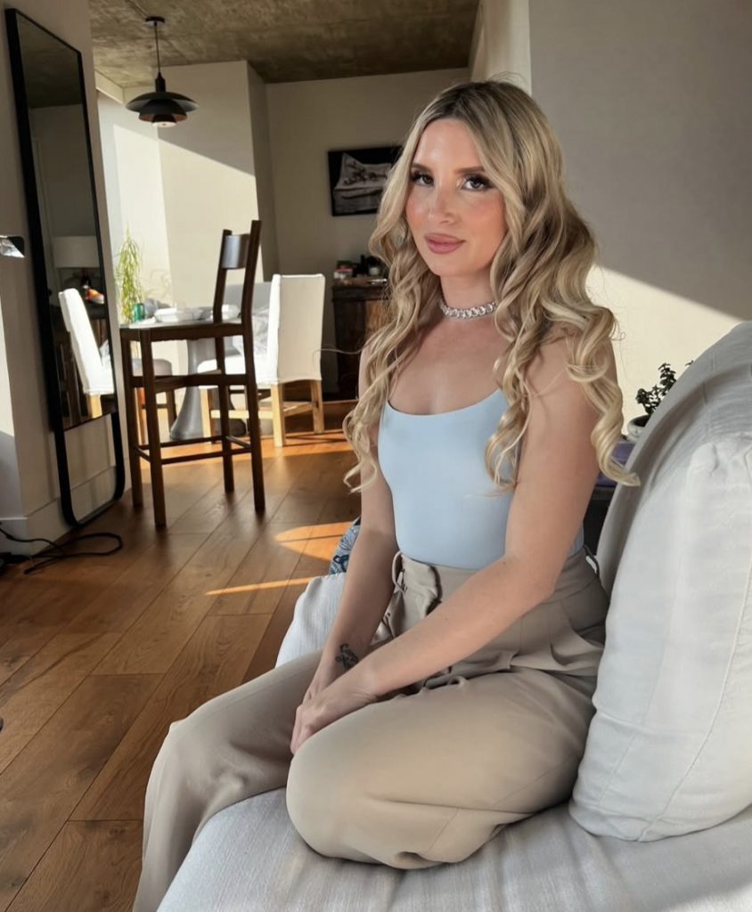 Woman sitting in a bright room